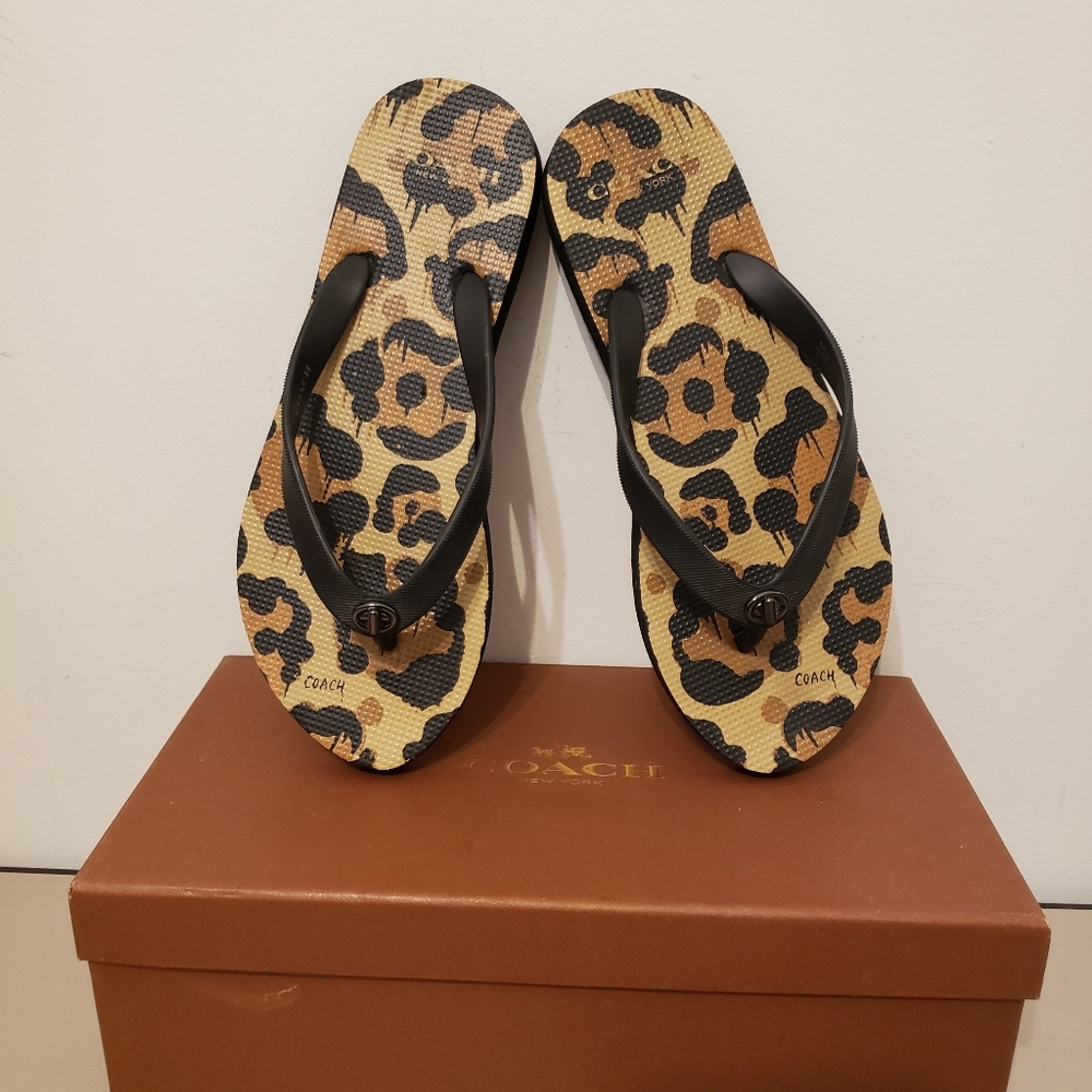 LIKE NEW COACH FLIP FLOPS  30.00